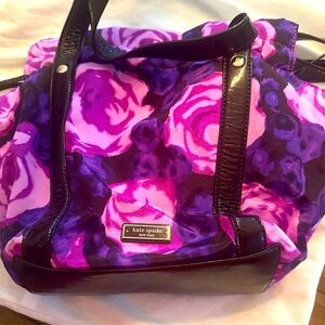 Kate Spade purse in beautiful floral design! Drawstring closure.
